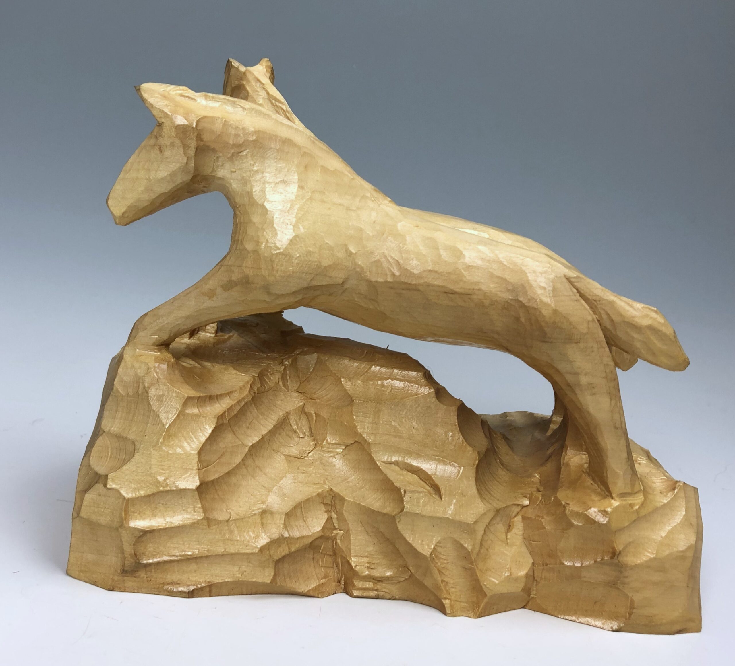 Wild horses sculpture in wood - David Howard Arts